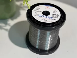 Spool of SGHYZ 1400°C FeCrAl resistance wire used for industrial heating applications, high-temperature alloy heating element coil banner